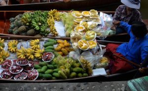 Boat market full of fresh fruit